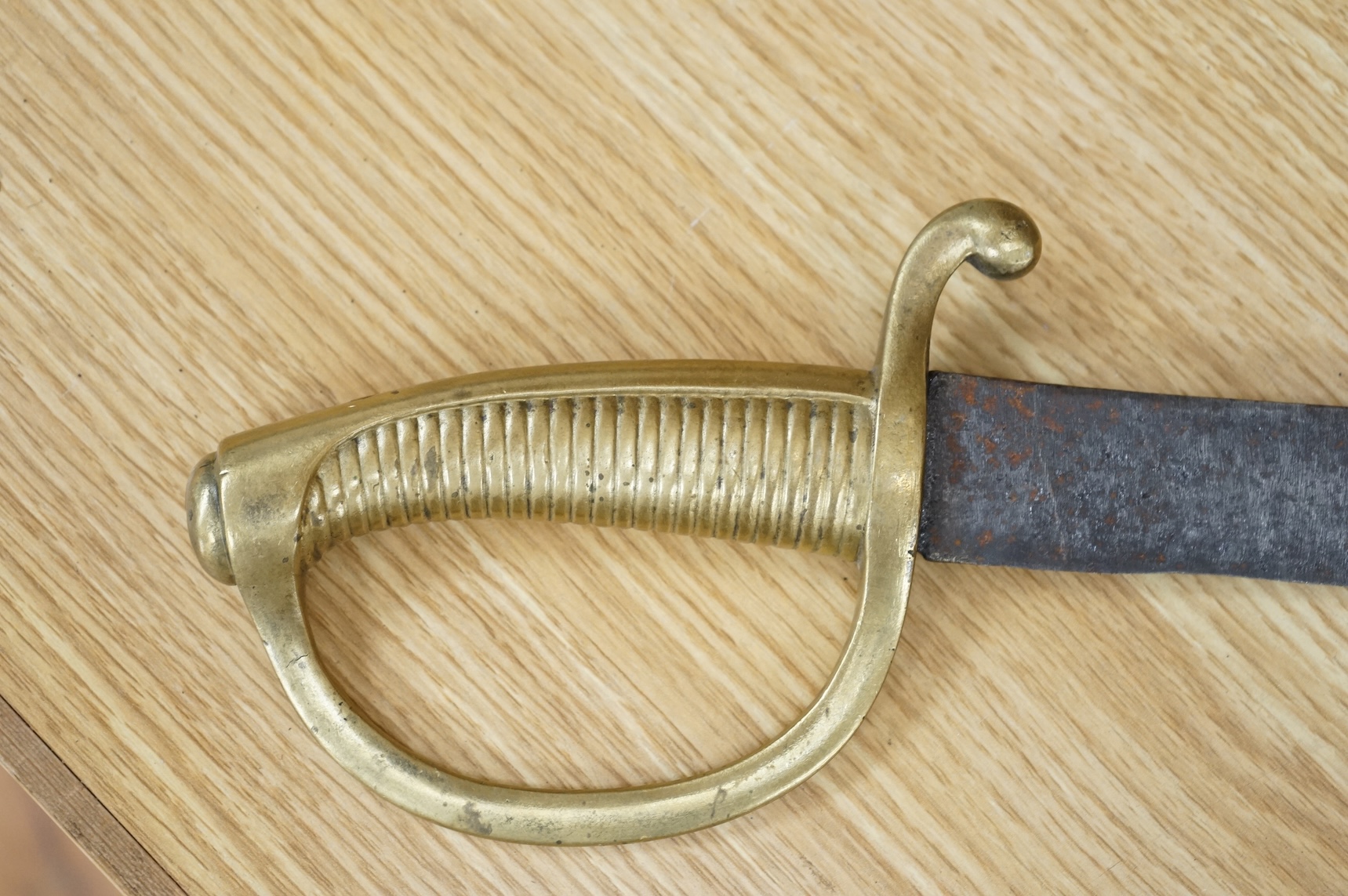 A mid 19th century infantryman’s short sword Gladius with cast brass hilt of universal pattern, stamped 306, together with two Continental infantyman’s side arm briquet, one stamped; M. and R. Boker Remscheid (3)
